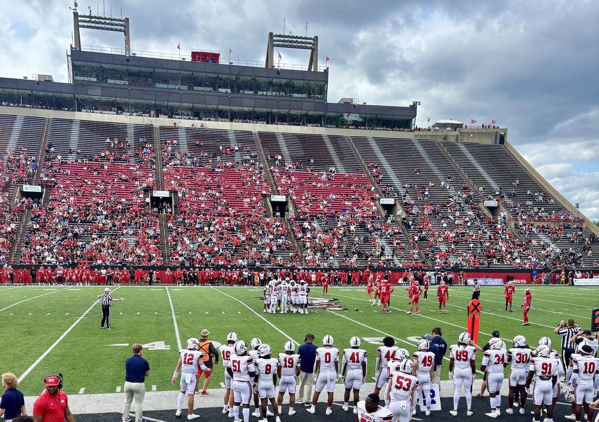 A college football game in a packed stadium